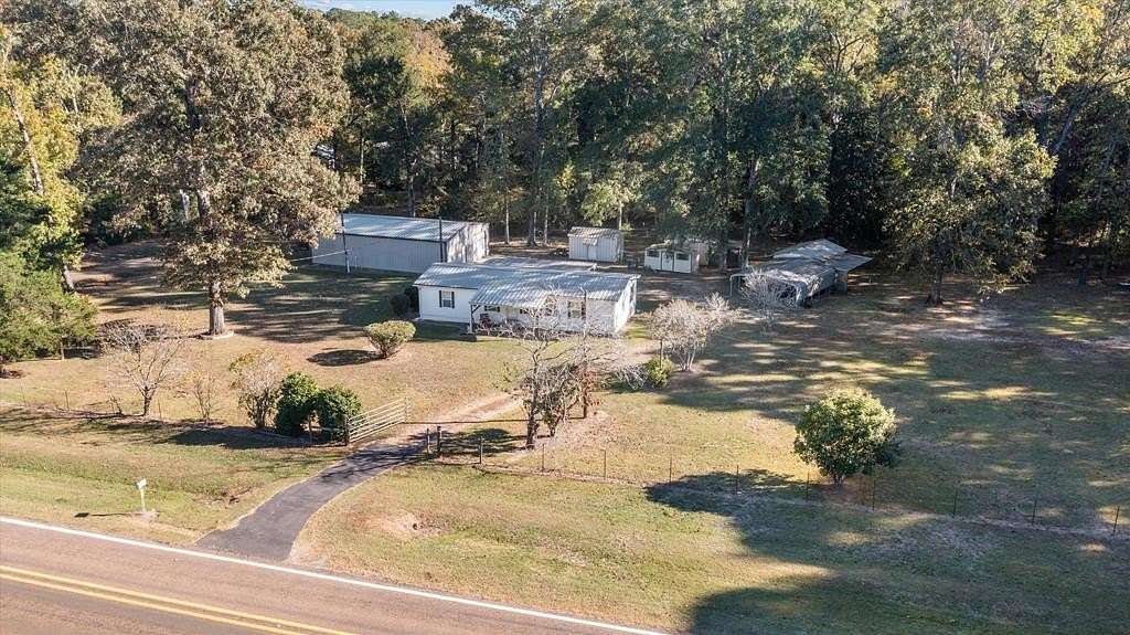 5.79 Acres of Land with Home for Sale in Hemphill, Texas