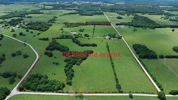 79.2 Acres of Land with Home for Sale in Bolivar, Missouri