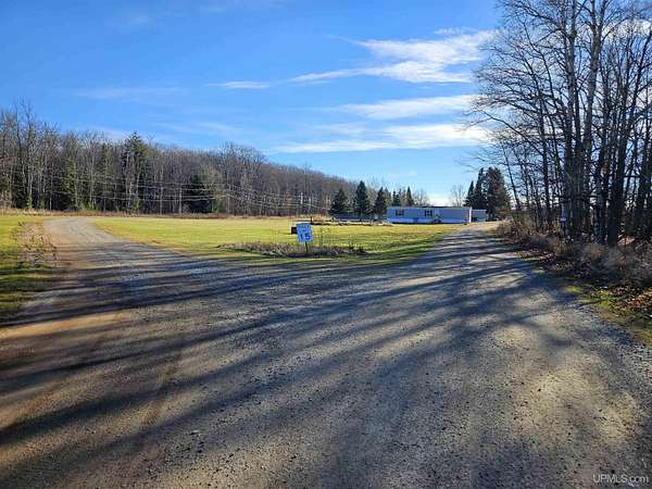 10.6 Acres of Improved Commercial Land for Sale in Crystal Falls, Michigan