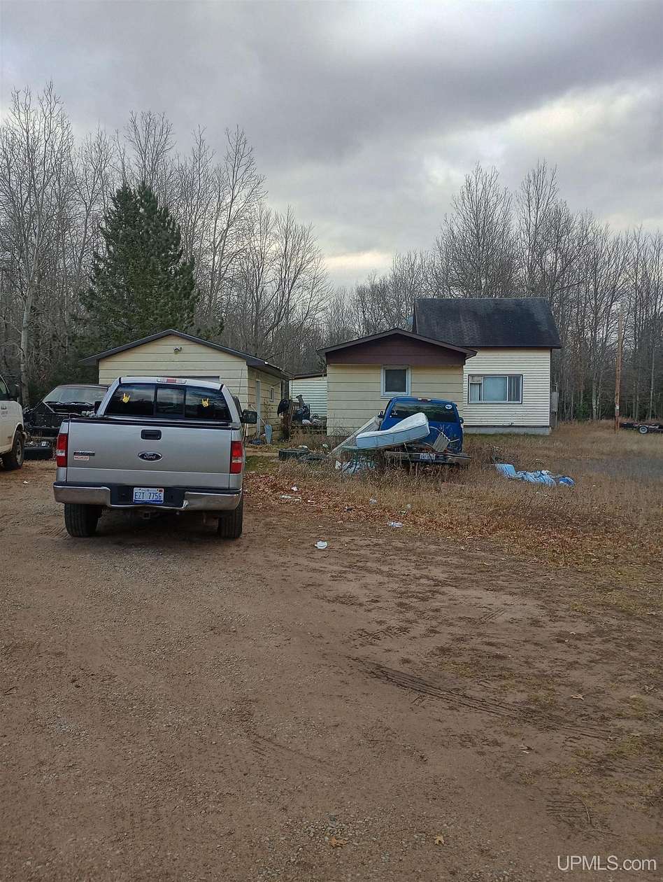 3 Acres of Residential Land with Home for Sale in Gladstone, Michigan