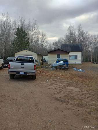 3 Acres of Residential Land with Home for Sale in Gladstone, Michigan