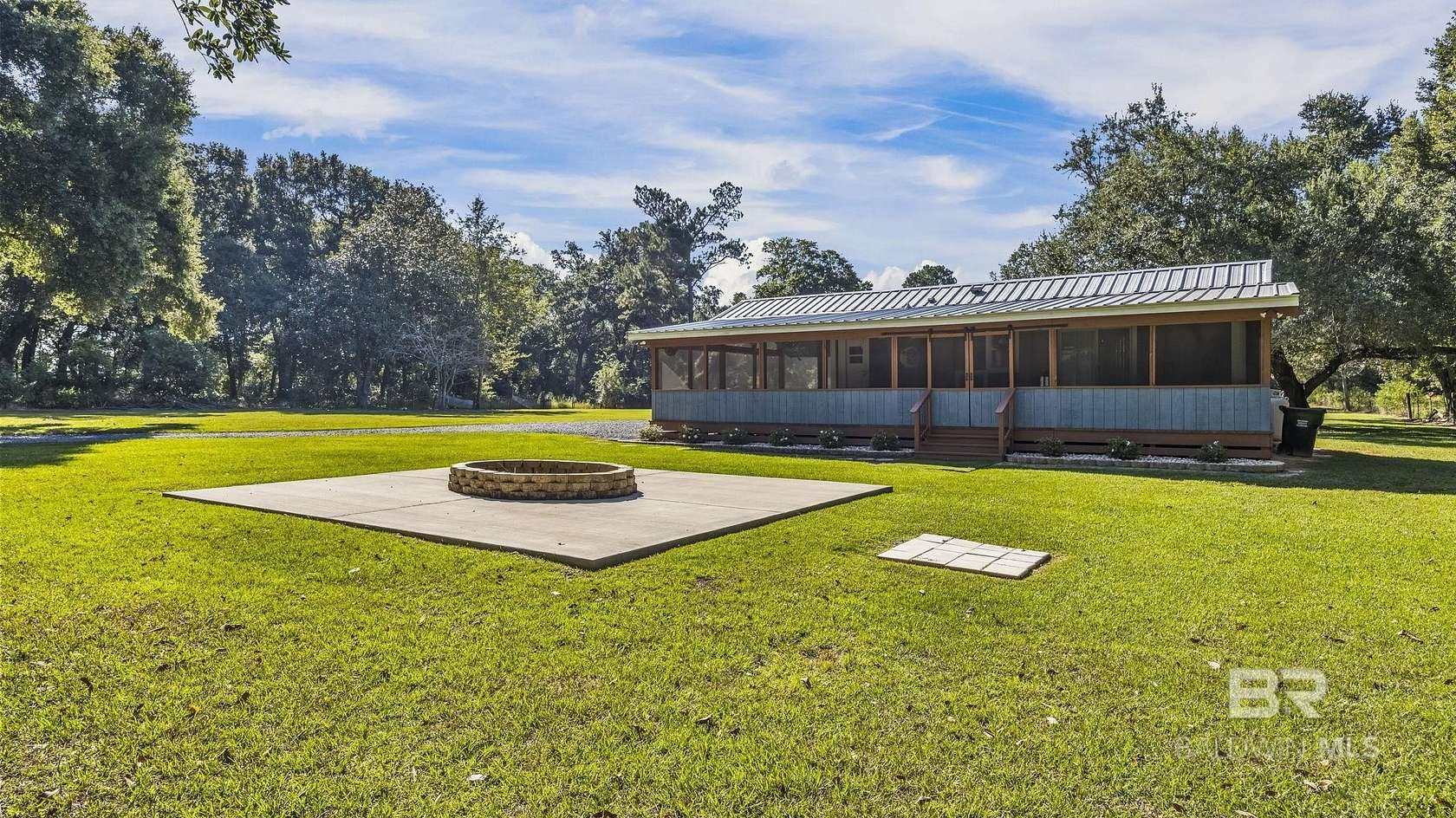 5.4 Acres of Residential Land with Home for Sale in Summerdale, Alabama