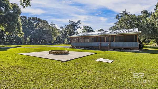 5.4 Acres of Residential Land with Home for Sale in Summerdale, Alabama