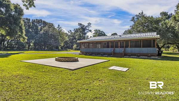 5.4 Acres of Land with Home for Sale in Summerdale, Alabama