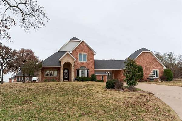 6.84 Acres of Residential Land with Home for Sale in Guthrie, Oklahoma