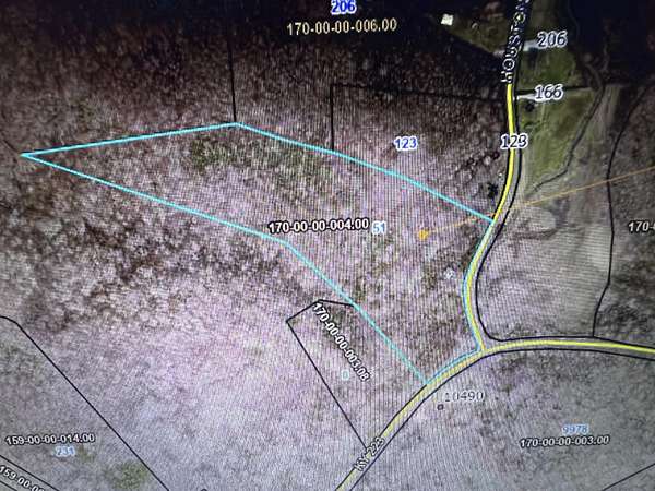 15.3 Acres of Land with Home for Sale in Flat Lick, Kentucky