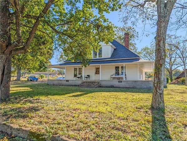 13.8 Acres of Land with Home for Sale in Taylors, South Carolina