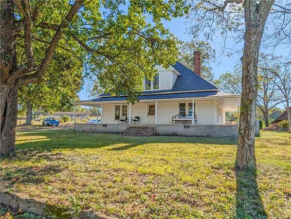 13.8 Acres of Land with Home for Sale in Taylors, South Carolina