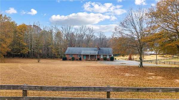 2.37 Acres of Residential Land with Home for Sale in Cumming, Georgia