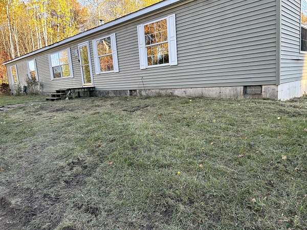 2 Acres of Residential Land with Home for Sale in Manton, Michigan