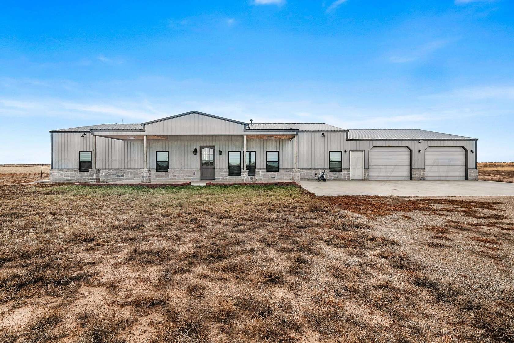 5 Acres of Residential Land with Home for Sale in Dumas, Texas