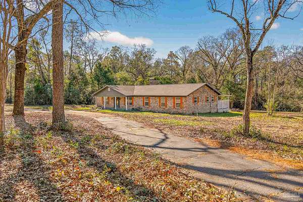 4 Acres of Residential Land with Home for Sale in Molino, Florida