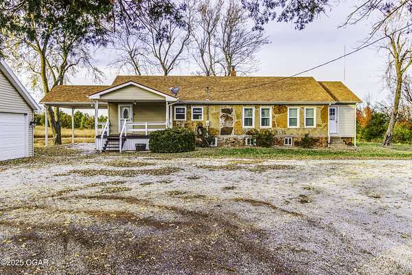 13 Acres of Recreational Land with Home for Sale in Carthage, Missouri