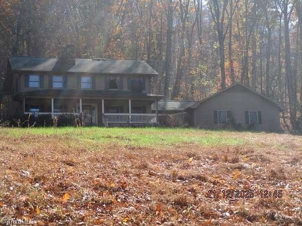 2.59 Acres of Residential Land with Home for Sale in Ronda, North Carolina