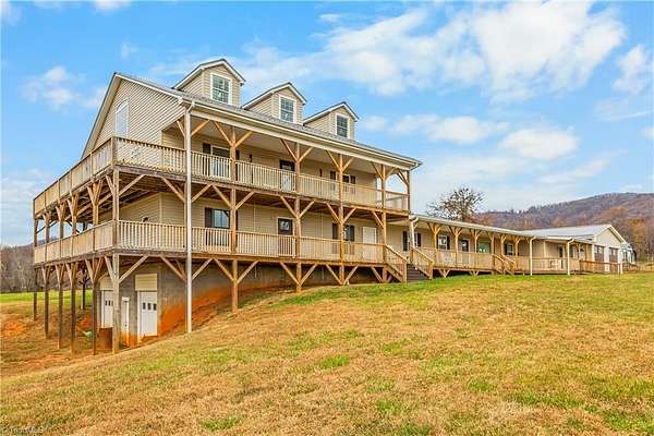 9.3 Acres of Residential Land with Home for Auction in Traphill, North Carolina