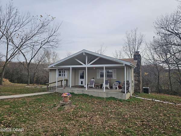 5 Acres of Residential Land with Home for Sale in Anderson, Missouri