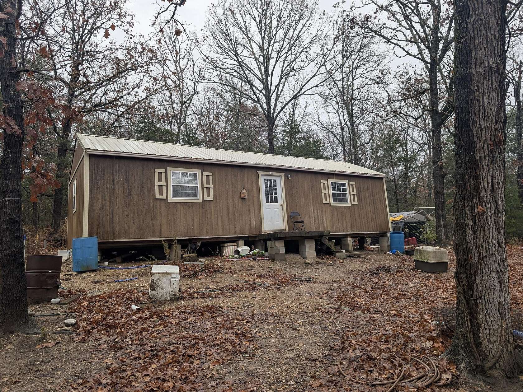 2.5 Acres of Residential Land with Home for Sale in Kissee Mills, Missouri