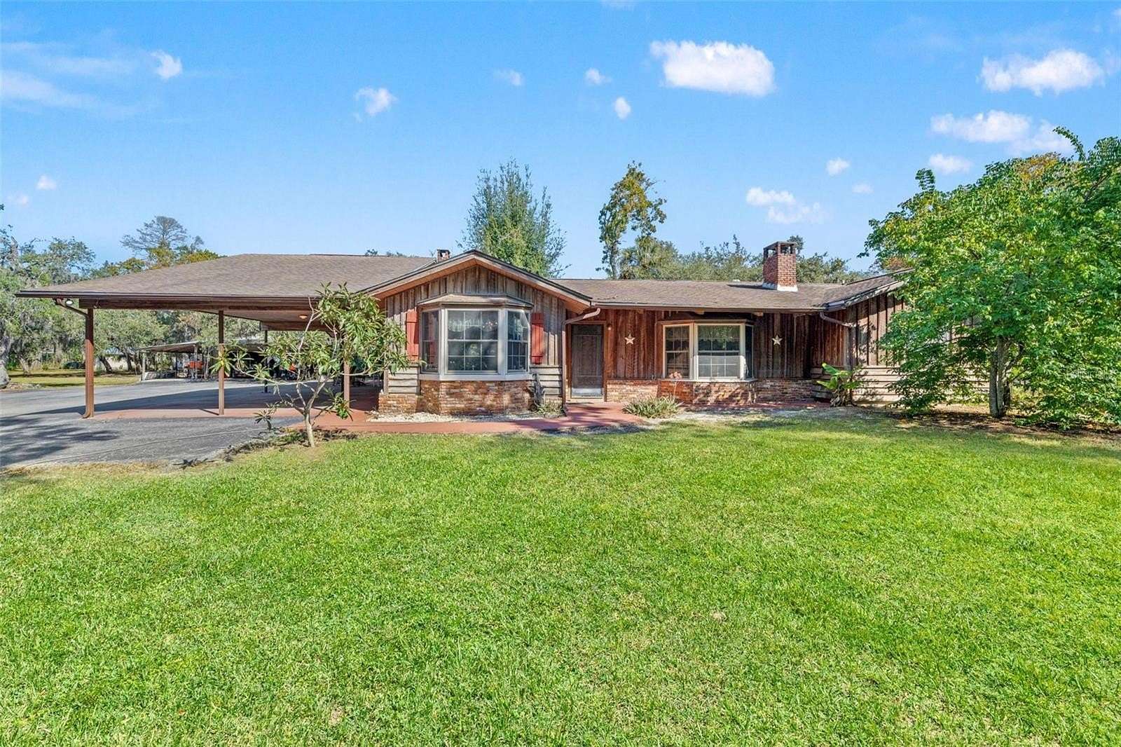 9.68 Acres of Land with Home for Sale in Hudson, Florida