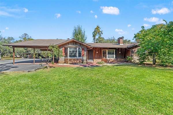 9.68 Acres of Land with Home for Sale in Hudson, Florida