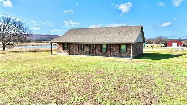 38.8 Acres of Recreational Land with Home for Sale in Quinton, Oklahoma