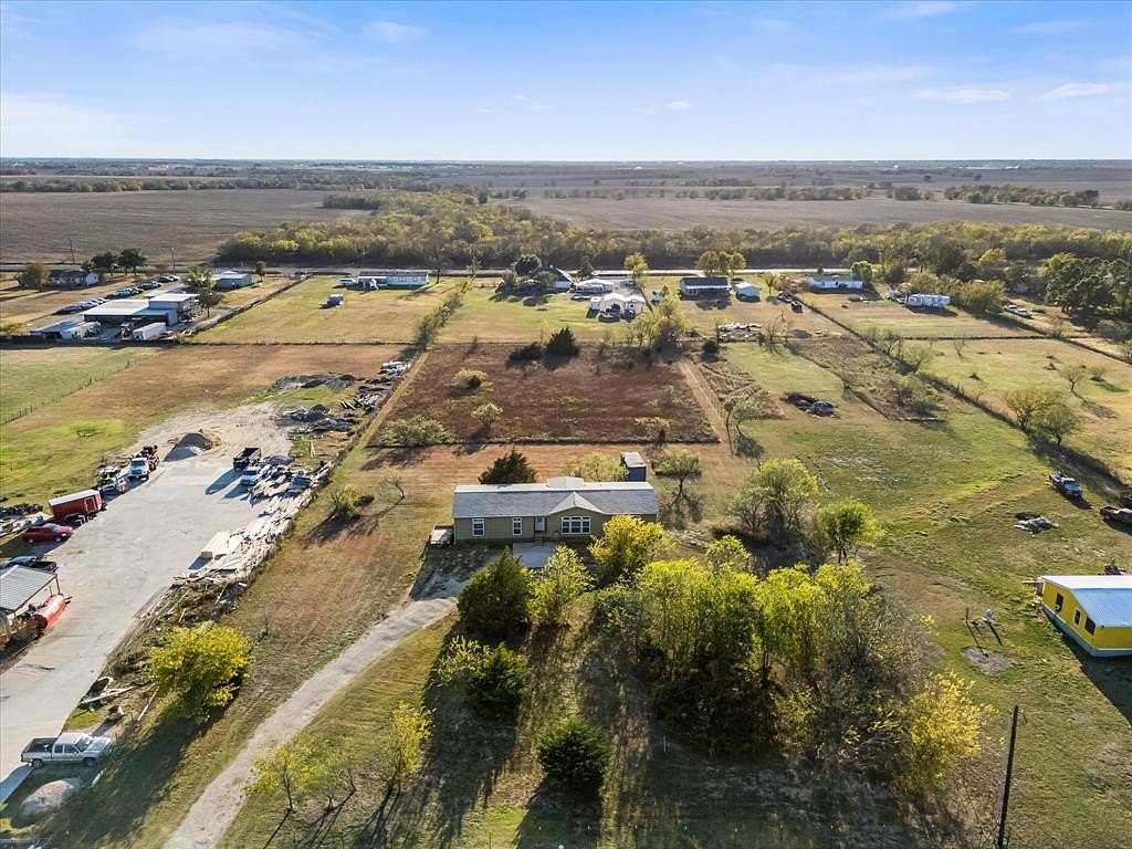 2.46 Acres of Residential Land with Home for Sale in Royse City, Texas