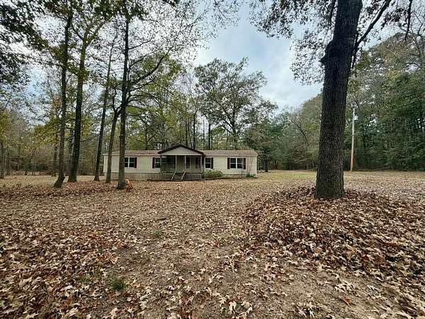 7.14 Acres of Residential Land with Home for Sale in Stonewall, Louisiana