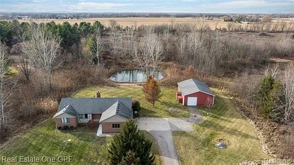 10 Acres of Recreational Land with Home for Sale in Allenton, Michigan