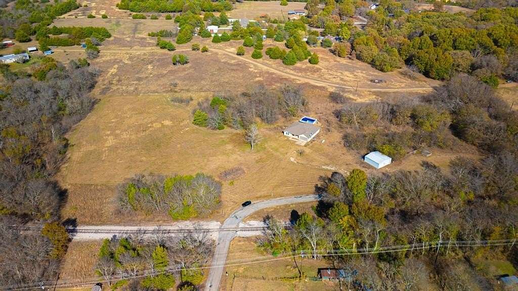 8.69 Acres of Land with Home for Sale in Bells, Texas