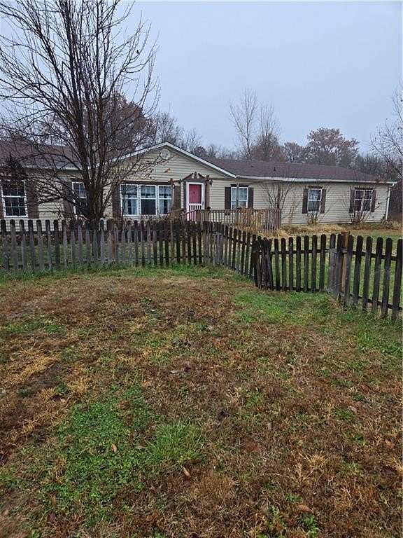 3.8 Acres of Residential Land with Home for Sale in Adrian, Missouri