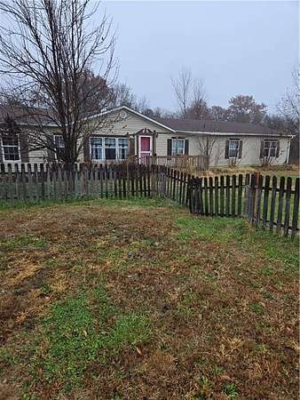 3.8 Acres of Residential Land with Home for Sale in Adrian, Missouri