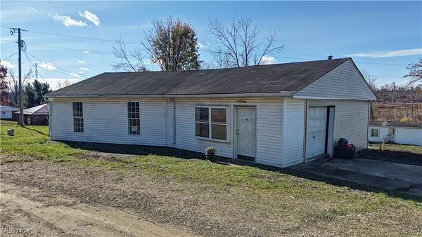 2.25 Acres of Residential Land with Home for Auction in Holmesville, Ohio