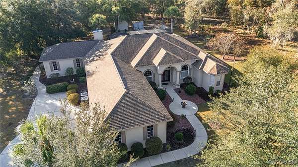 2.59 Acres of Residential Land with Home for Sale in Dunnellon, Florida