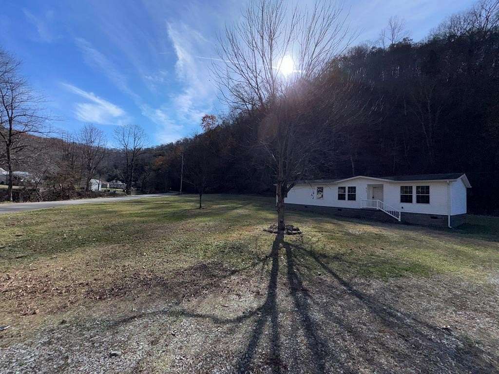 17.7 Acres of Land with Home for Sale in Kimper, Kentucky