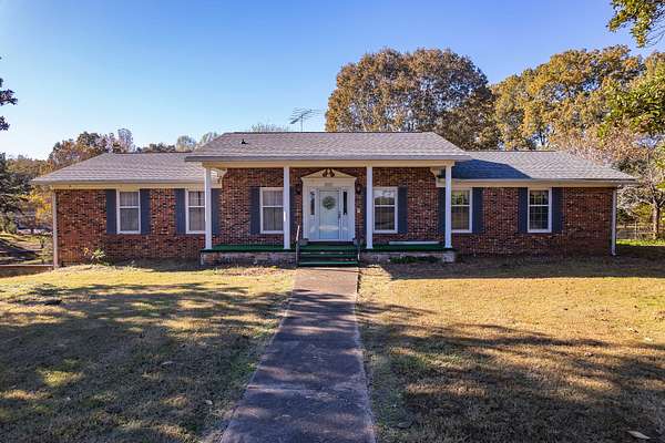 8.5 Acres of Residential Land with Home for Auction in Medon, Tennessee