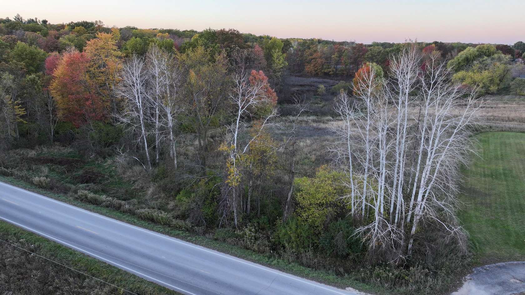 1.14 Acres of Residential Land for Sale in Sand Lake, Michigan