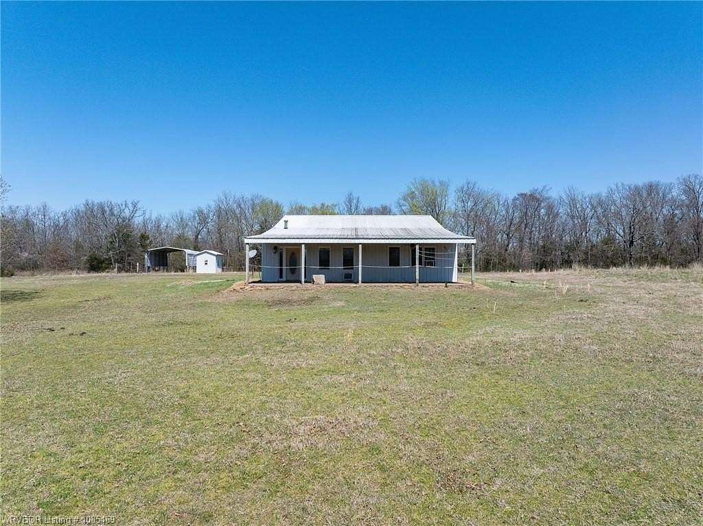 80 Acres of Land with Home for Sale in Muldrow, Oklahoma