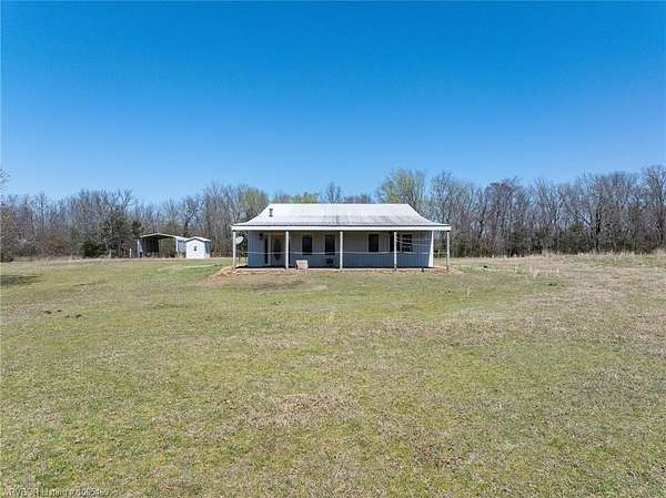 80 Acres of Land with Home for Sale in Muldrow, Oklahoma