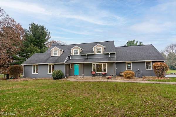 7.26 Acres of Residential Land with Home for Sale in Louisville, Ohio