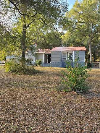 4.86 Acres of Land with Home for Sale in Ozark, Alabama