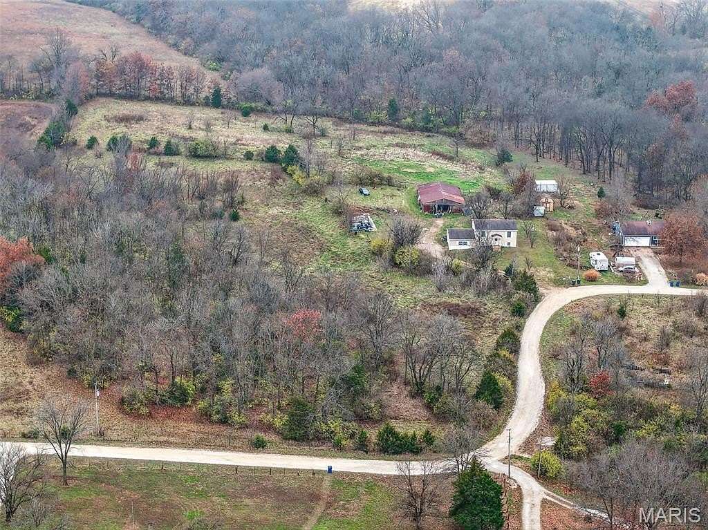 10 Acres of Land with Home for Sale in Moscow Mills, Missouri