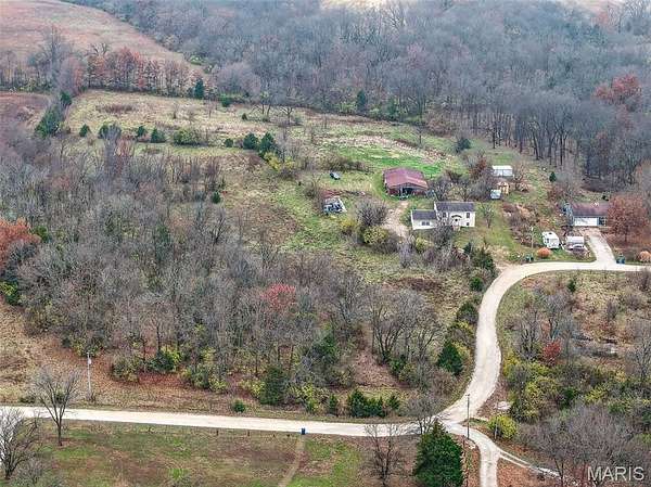 10 Acres of Land with Home for Sale in Moscow Mills, Missouri
