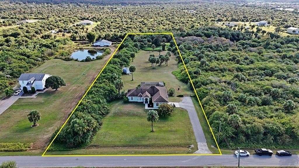 2.5 Acres of Residential Land with Home for Sale in Naples, Florida