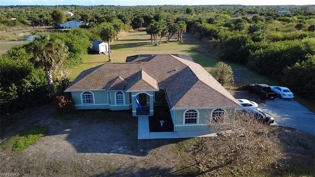 2.5 Acres of Land with Home for Sale in Naples, Florida