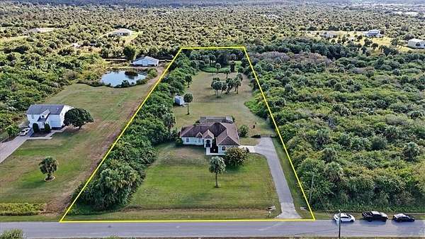 2.5 Acres of Residential Land with Home for Sale in Naples, Florida