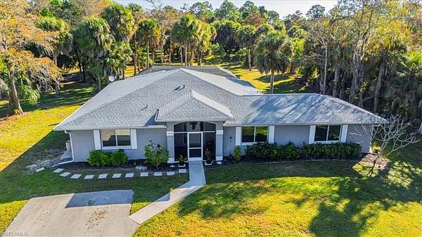 2.27 Acres of Residential Land with Home for Sale in Naples, Florida