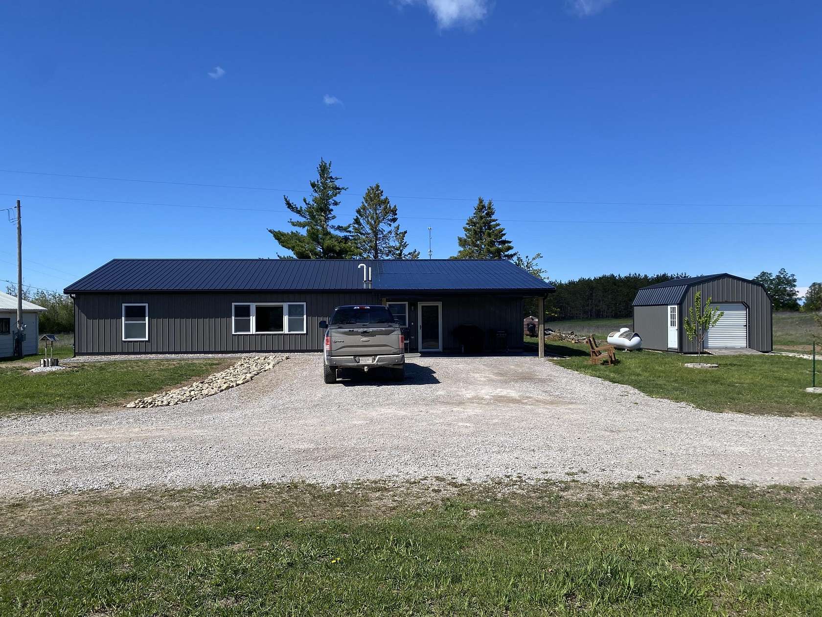 2.5 Acres of Residential Land with Home for Sale in Posen, Michigan