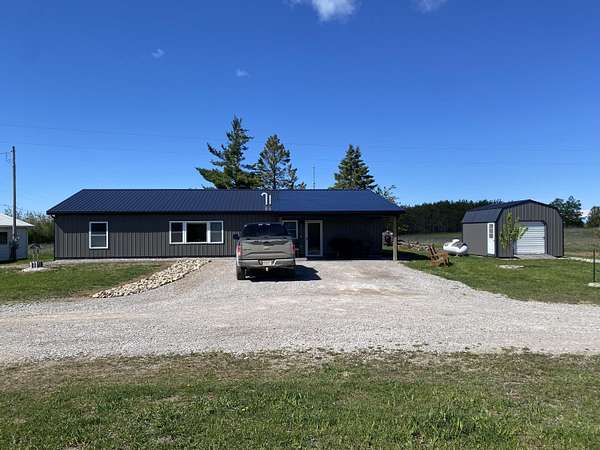 2.5 Acres of Residential Land with Home for Sale in Posen, Michigan