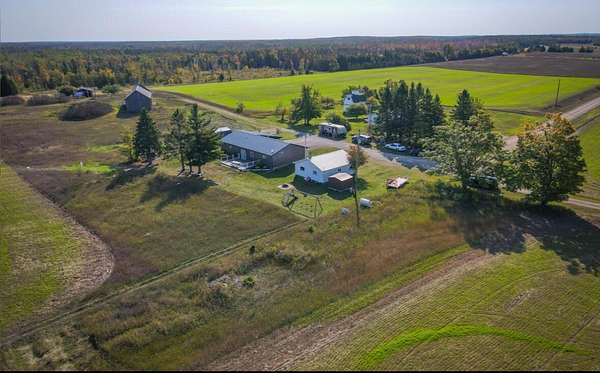 2.5 Acres of Land with Home for Sale in Posen, Michigan
