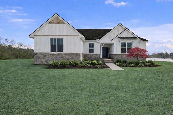 2.24 Acres of Land with Home for Sale in New Hudson, Michigan