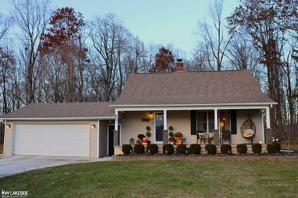 3.57 Acres of Residential Land with Home for Sale in Lenox Township, Michigan